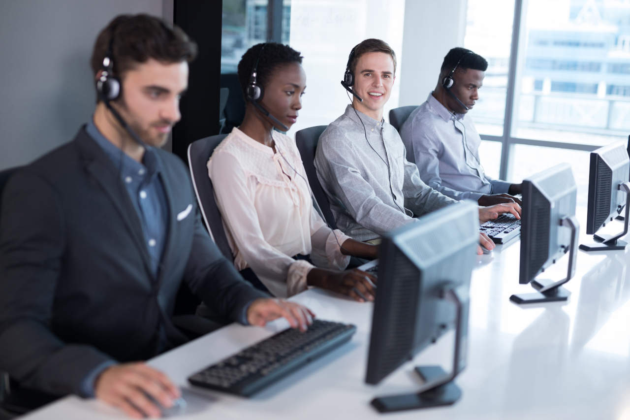 Customer service executives working at office
